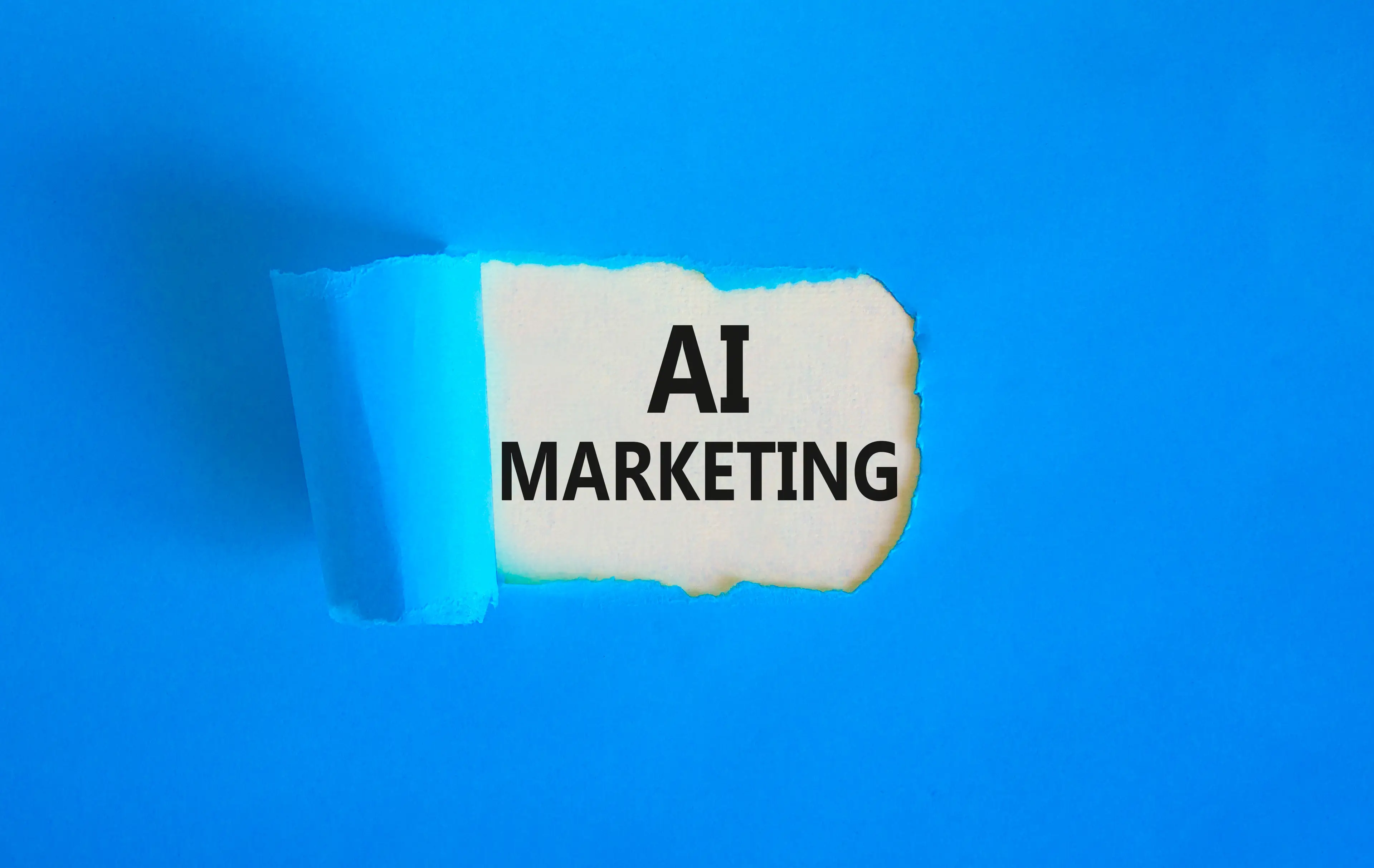 Blue graphic with the words "AI Marketing"