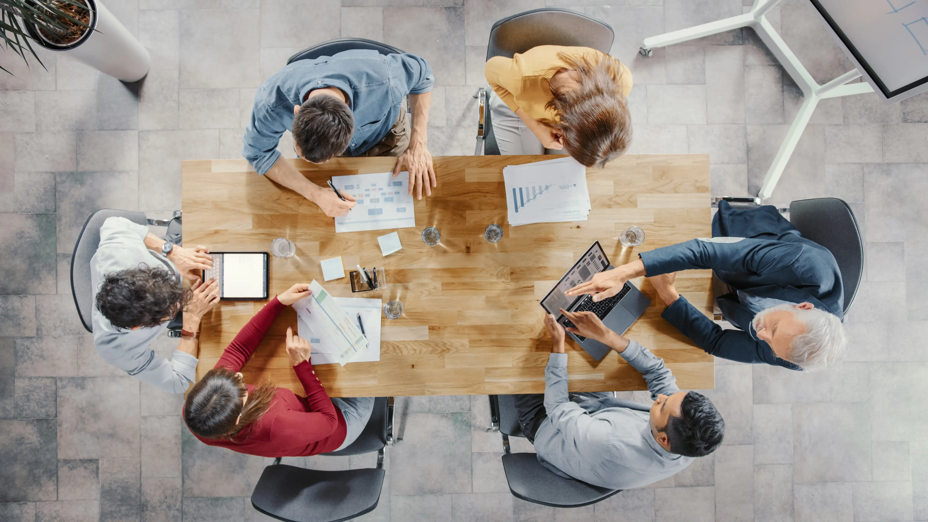 Marketers sitting around a table at a meeting